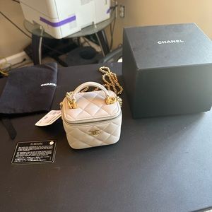 Crème off-white color Chanel MINI toilet tree bag with tags